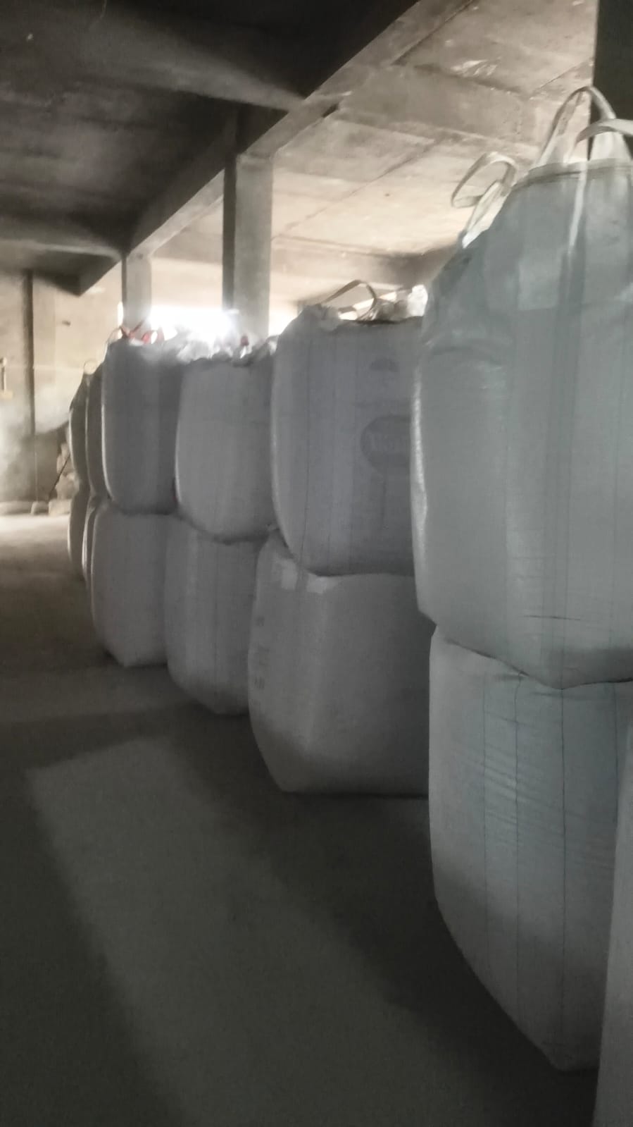 Rows of stacked bulk bags in the Kolkata storage area