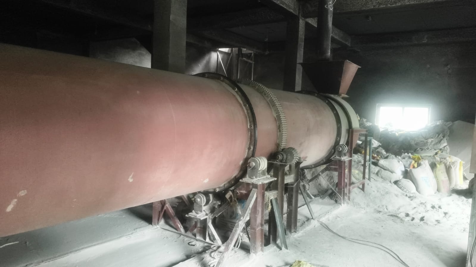 Rotary processing drum with feed chute at the Nagpur plant